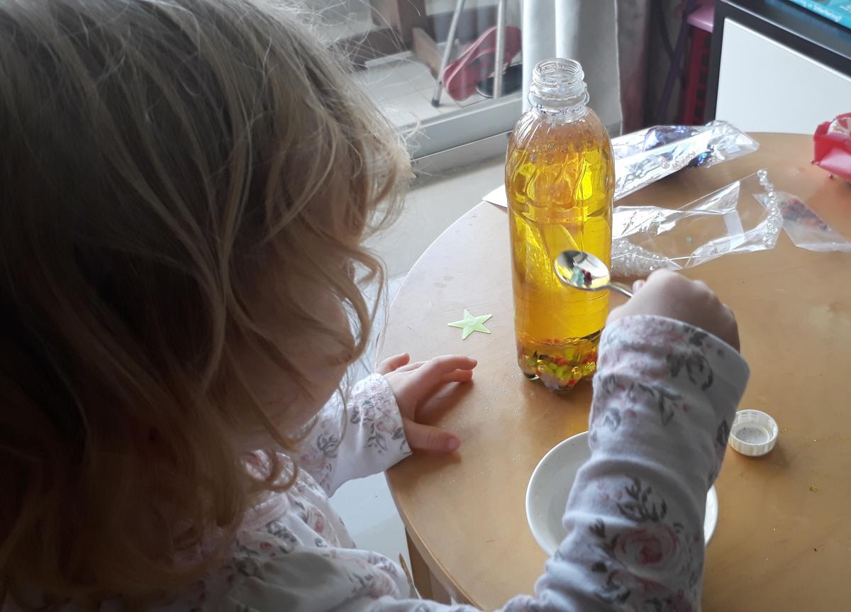 Jessica's daughter playing with sensory activity
