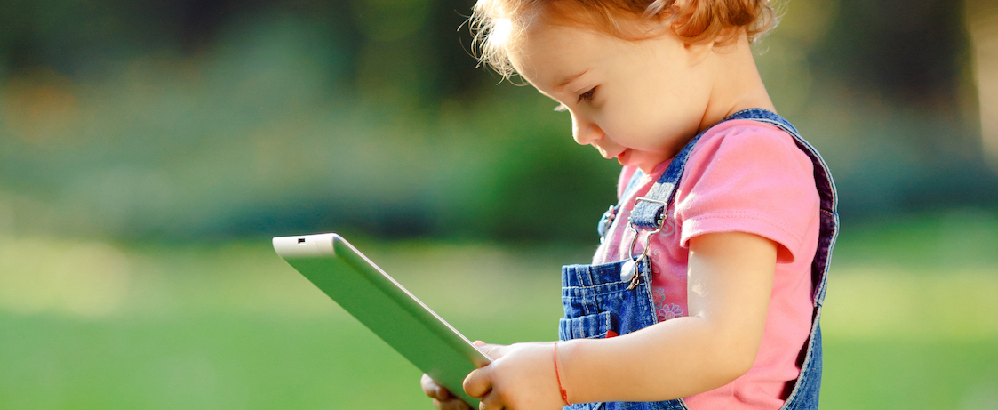 girl reading on a tablet