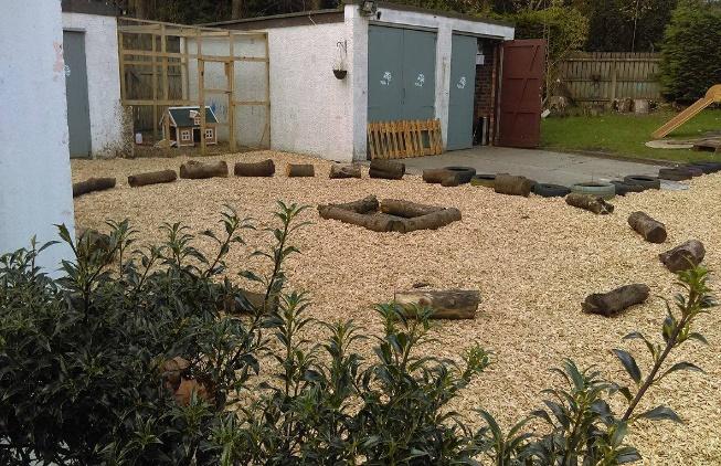 Sketch and photo of completed outside space as designed with children