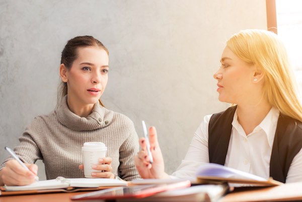 two women in discussion